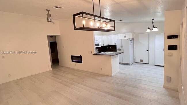 Building Photo - 10669 Boca Entrada Blvd