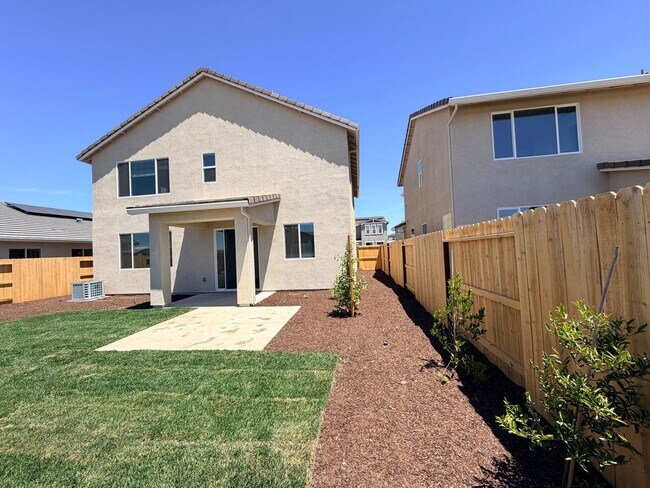 Building Photo - **Welcome to this beautifully designed 4-bedroom, 3-bathroom home offering modern living space.**