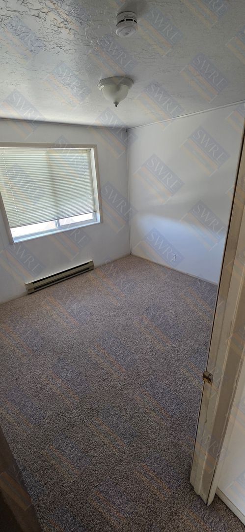 Building Photo - Available now! View Today by calling Rentl...