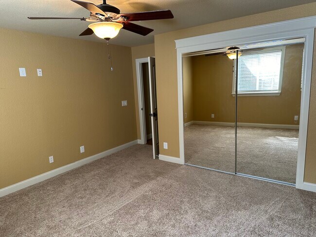 Bedroom with Mirrored Closet Doors - 3813 Sky Hawk Ct
