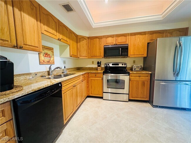 Building Photo - 6760 Pelican Bay Blvd