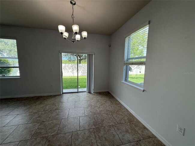 Building Photo - 6568 S Goldenrod Rd