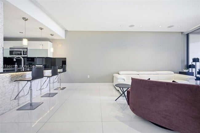 Building Photo - 17121 Collins Ave