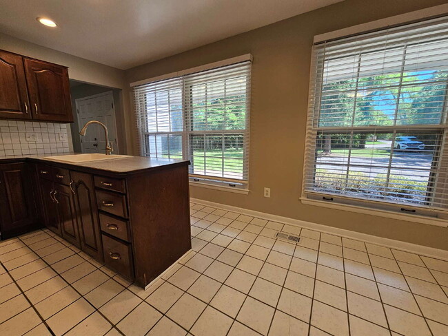 Building Photo - Private 4 Bedroom Home on 0.75 Acres with Great Room Fireplace, Wet Bar & 3-Season Room, 2 Car At...