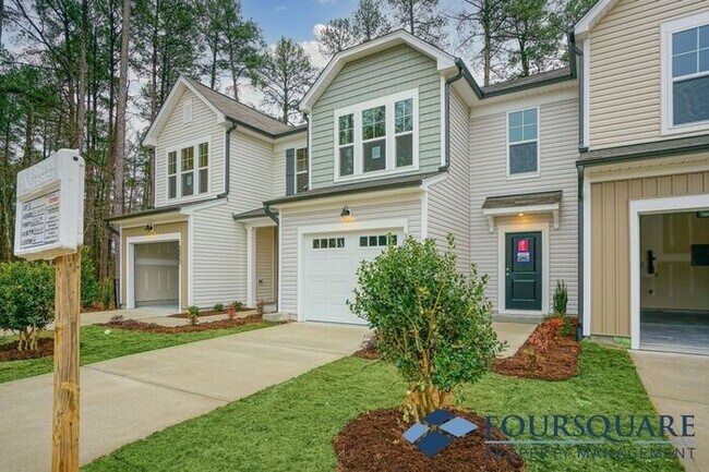 Building Photo - Spacious 3-Bed End- Unit Townhome with Mod...