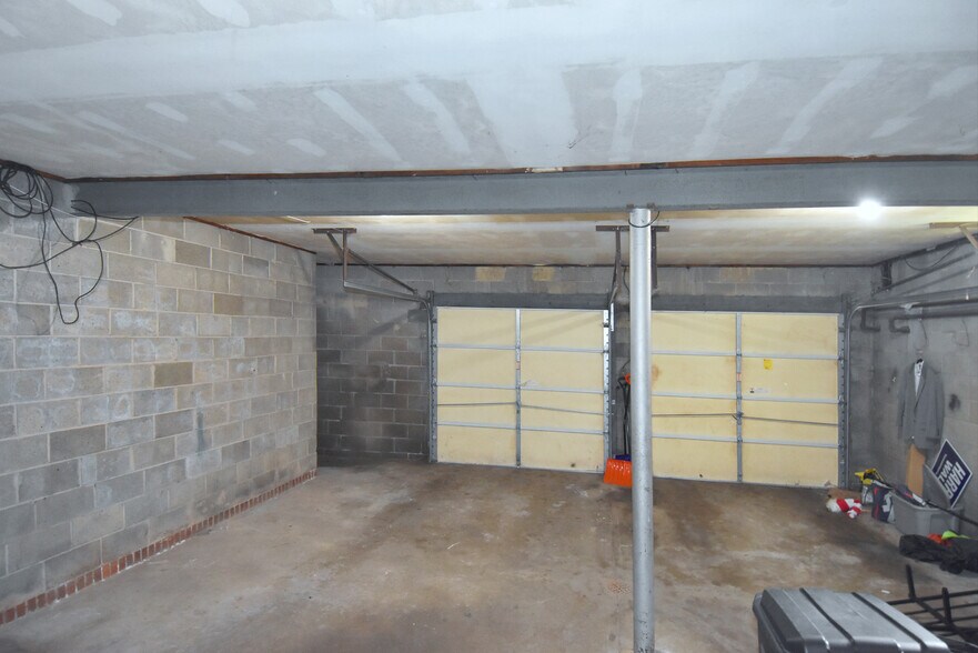 Ground floor shared garage has parking for compact car. - 3156 Glendale Ave