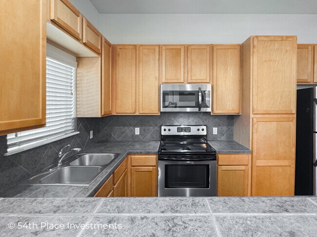 Building Photo - 8229 W 54th Ave