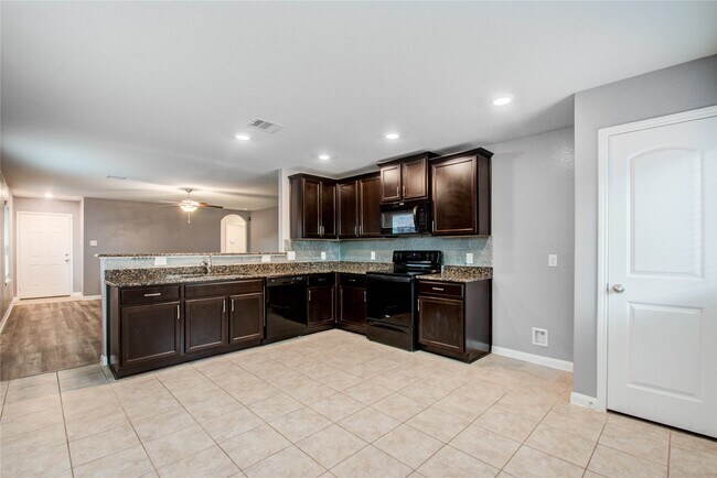 Building Photo - 6222 El Topacio Dr