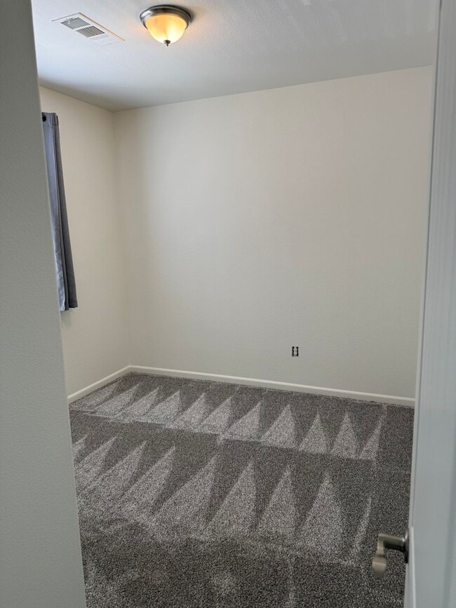Building Photo - Located in Riata in Pioneer Meadows