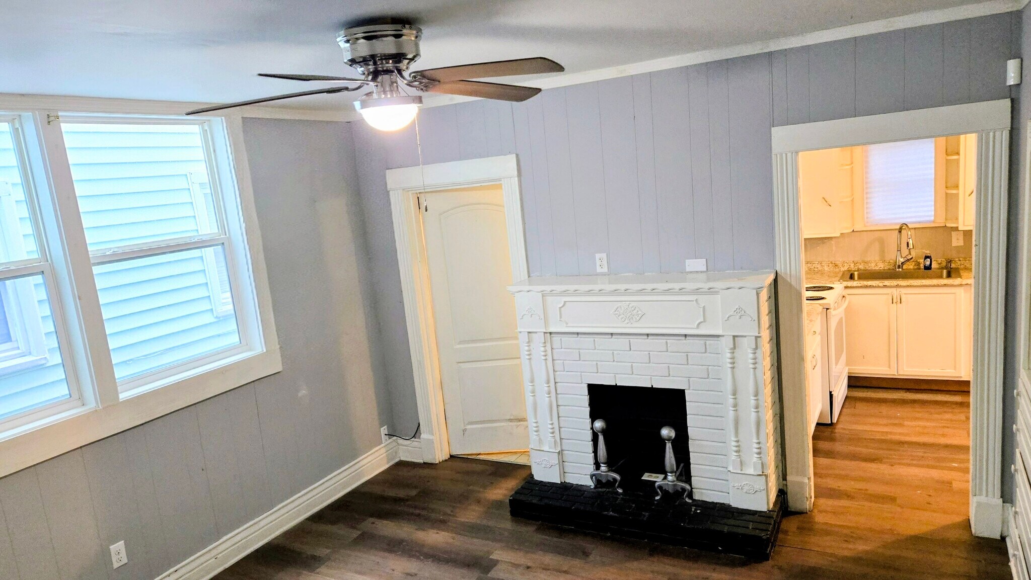 The dining room has and ornamental fireplace and built-in serving cabinet - 3348 Bohannon Ave