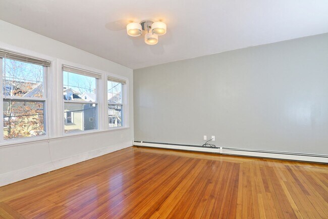 Building Photo - First Floor- 3 Bedroom with parking and ow...