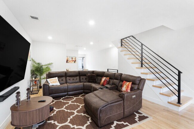 Building Photo - Movie in special, first 1/2 month rent is FREE! Charming 2-Bedroom Condo with 2 Full & 2 Half Bat...