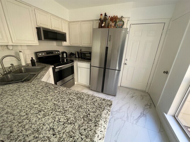 Building Photo - 12255 W Village Dr