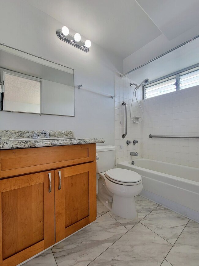 Building Photo - For Rent | Full Size Studio Apartment with...
