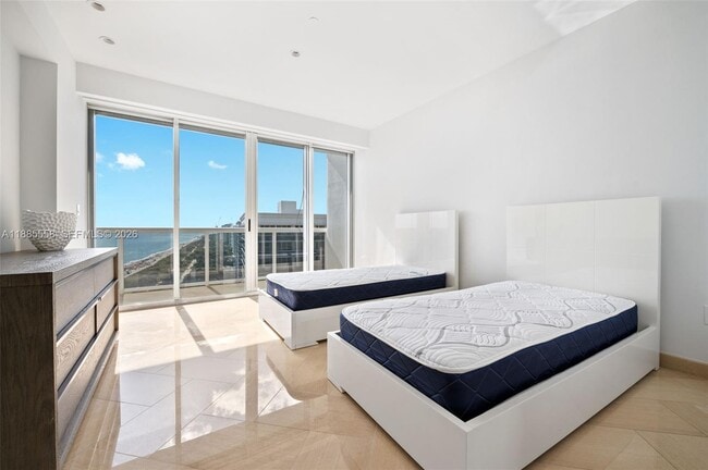 Building Photo - 9601 Collins Ave