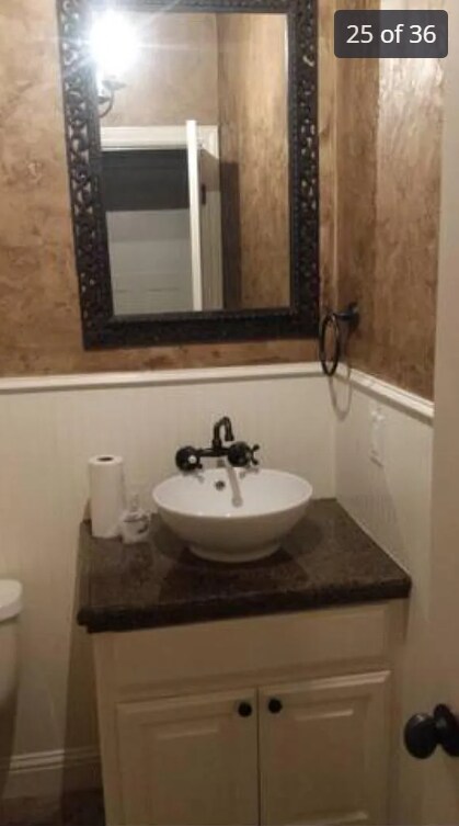 restroom near kitchen and living room - 4413 Spyglass Dr