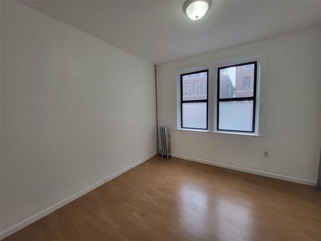 Building Photo - 37-68-68 64th St