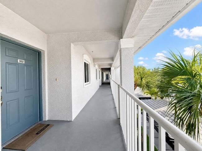 Building Photo - Peaceful Preserve-View Condo in Gated Blue Heron