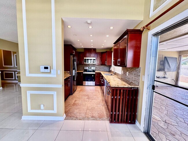 Building Photo - Available now | A 4 Bedroom, 2 Bathroom Si...