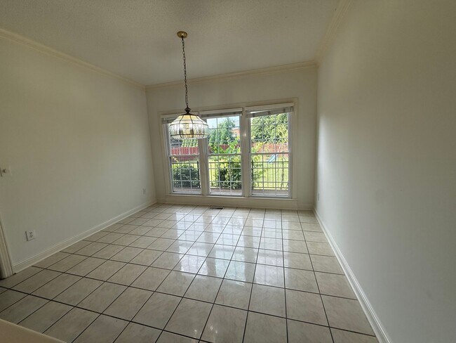 Building Photo - Spacious 5-Bedroom Home on a Corner Lot in...