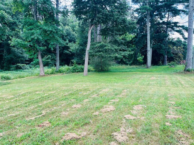 Building Photo - Wow! Check out this charming 4-bedroom, 1-...