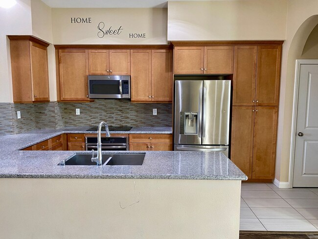 Building Photo - Stylish 3-Story Townhome with Balconies & Open-Concept Living