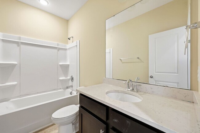 Building Photo - Modern 4BR Townhome with Washer/Dryer & Pet-Friendly Living in Morrisville!