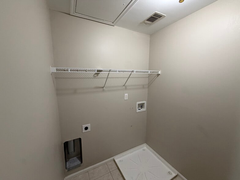 laundry room upstairs on the left - 3315 Watson Gate Rd