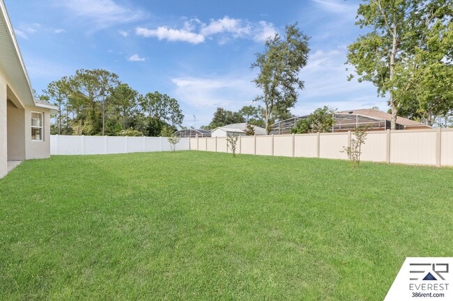 Building Photo - FULLY FENCED, LIKE NEW 3/2/2 IN DESIRABLE PINE GROVE