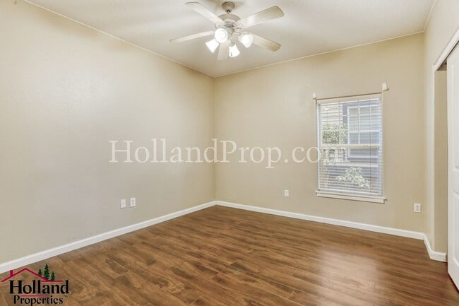 Building Photo - Elegant One-Bedroom Condo with Natural Light & Prime Location