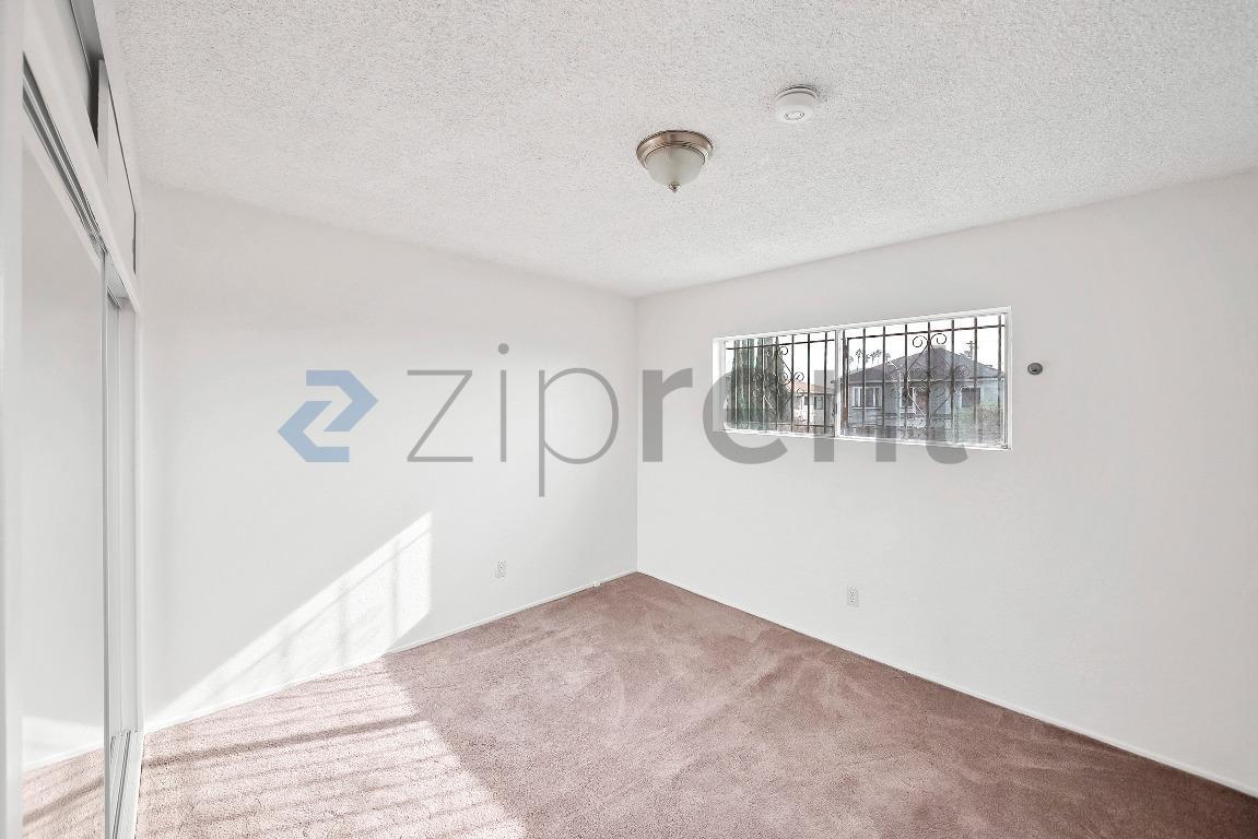 Building Photo - 2458 Normandie Ave