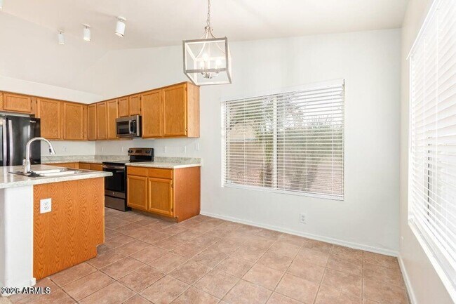 Building Photo - 6585 N 77th Dr