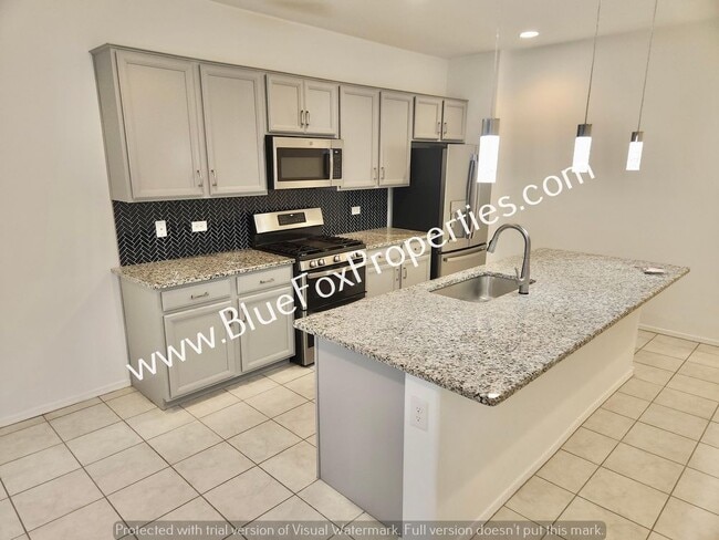 Building Photo - 10897 W Sarabella Dr