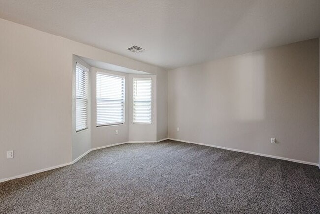 Building Photo - Introducing a stunning 4-bedroom, 2.5-bath...
