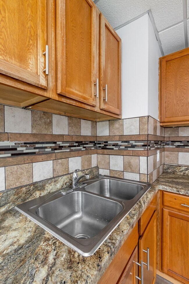 Building Photo - 2 Bed Home with Large Yard & Covered Porch – $1,295/mo