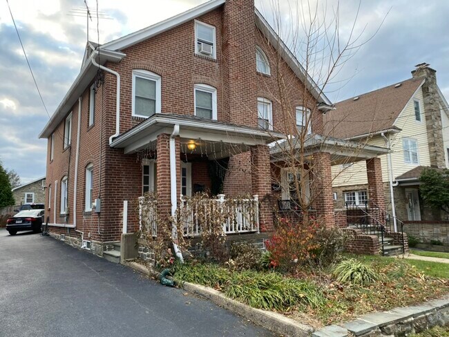 Covered porch, parking for 4 cars - 2432 E County Line Rd