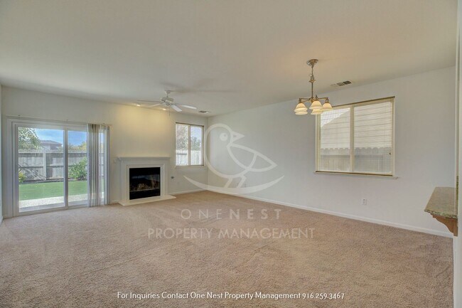 Building Photo - Charming single-story home nestled in the serene Edgewater Community