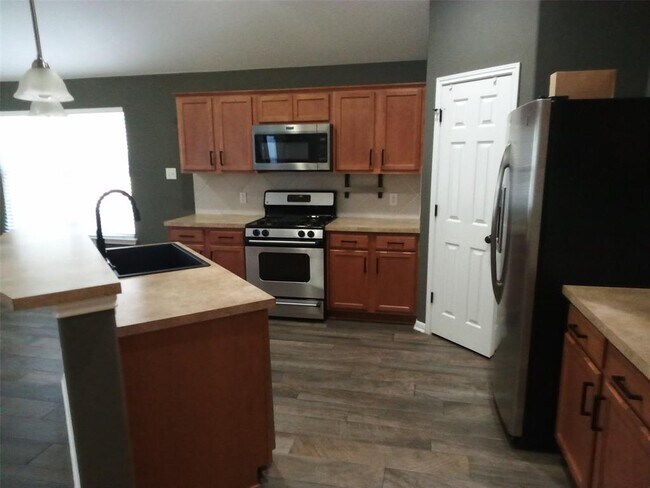 Building Photo - 2412 Tumbling River Dr