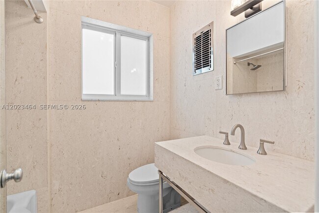 Building Photo - 10190 Collins Ave