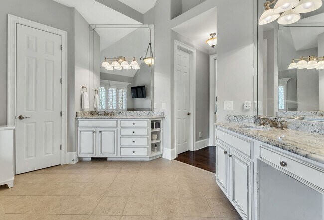 Building Photo - Fully Furnished 4 Bedroom, 3.5 Bath w/ 3 Car Garage and Unfinished Basement in Governors Club
