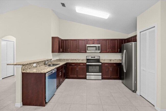 Building Photo - 8736 98th Ct