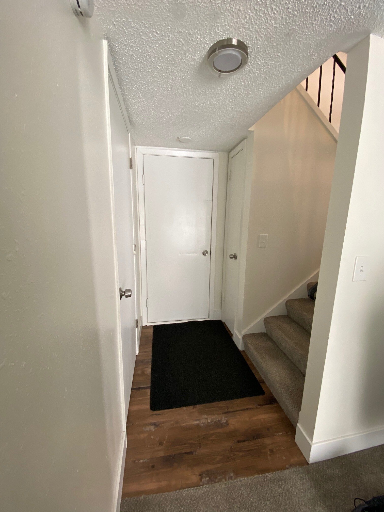 door leads to the two car tuck under garage - 6228 Magnolia Ln N