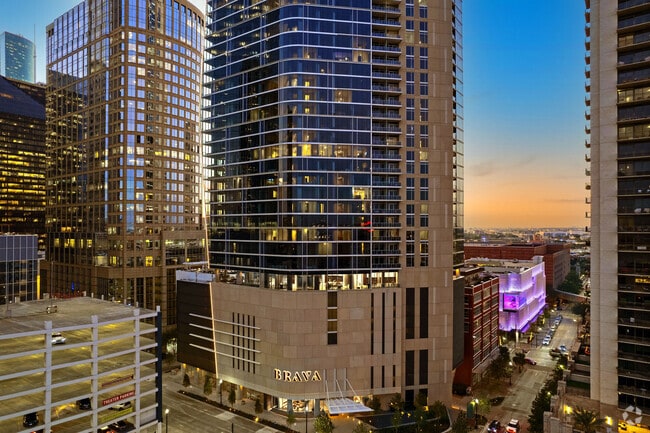 Soar above the city in luxury high-rise living. - Brava