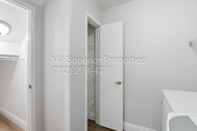 Building Photo - SW!!! 2 Bedroom Condo 1st Floor!! 2 Garage!! Gated!! Community Pool!! Fitness Room!! 2 Primary Be...