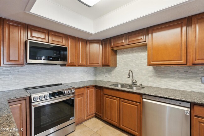 Building Photo - 7940 E Camelback Rd