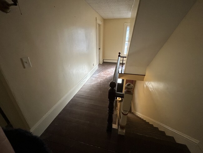 Upstairs hallway. - 23 Pleasant St