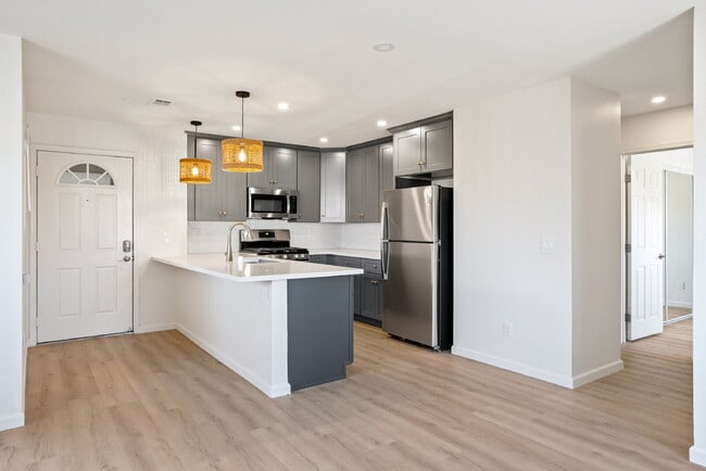 Building Photo - AVAILABLE SEPTEMBER - Coastal-Convenient 2 Bed Retreat with Private Balcony