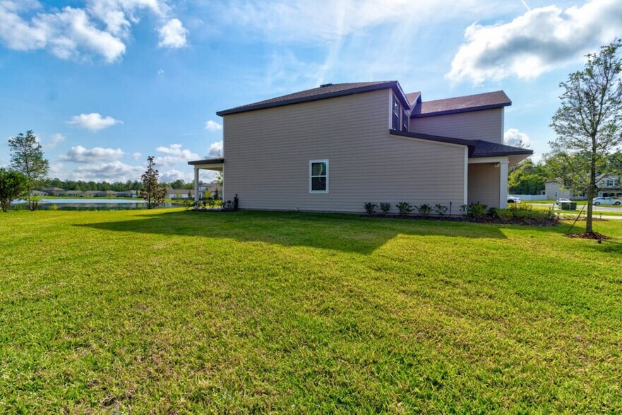 Great side yard for running around in. - 509 Falcon Ridge Rd