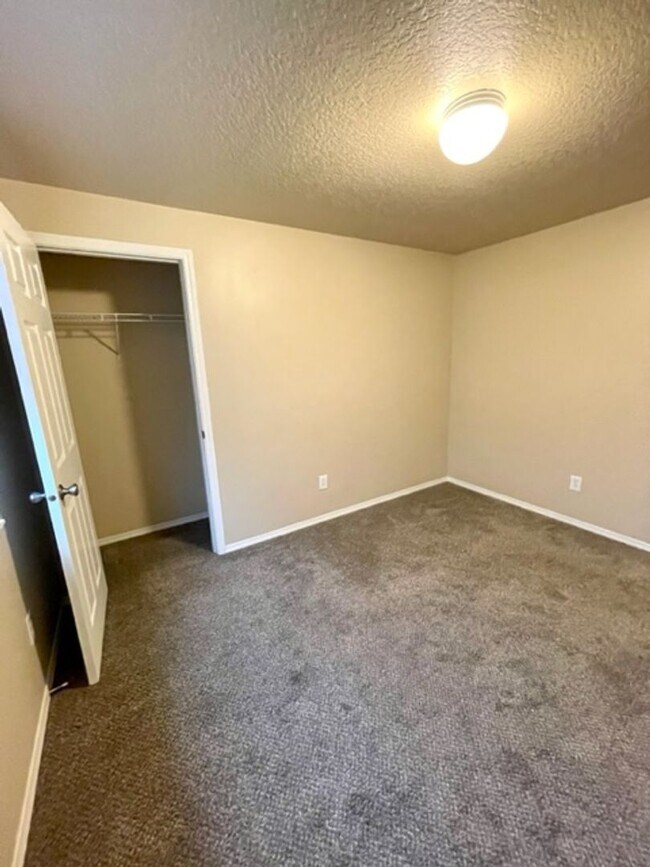 Building Photo - Single level home in Foxborough! Fenced yard!  A/C and a gas fireplace!