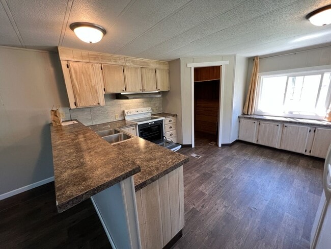 Building Photo - Semi-Rural 2 Bedroom 1 Bath Updated Mobile Home w/ Amenities